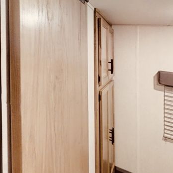Best RV Center - Storage in the master bedroom and a privacy sliding door. - RV Dealers Near Me - Turlock, California Best RV Center - Storage in the master bedroom and a privacy sliding door. - RV Dealers Near Me - Turlock, California