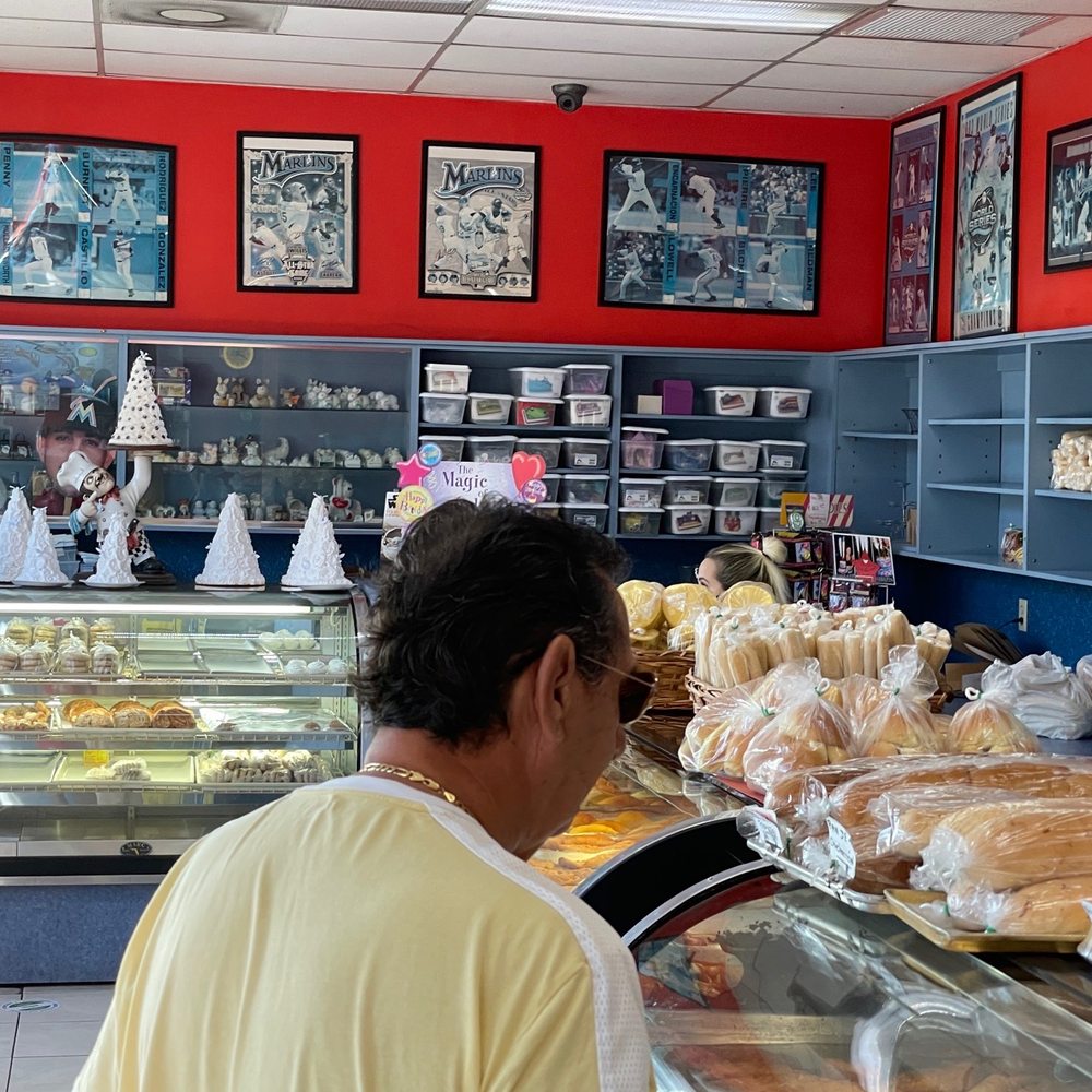 Rosy Bakery - a woman in a yellow shirt at the counter - Bakeries Near Me - Miami, Florida Rosy Bakery - a woman in a yellow shirt at the counter - Bakeries Near Me - Miami, Florida