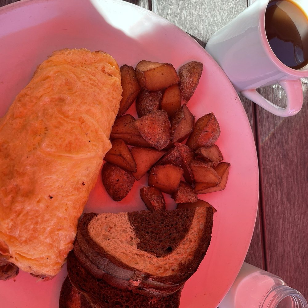Breakfast -many omelets with various fillings, potatoes are great, marbled rye toast - Tasty Breakfast -many omelets with various fillings, potatoes are great, marbled rye toast - Tasty