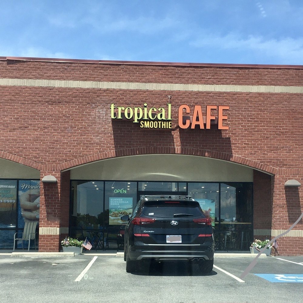 Tropical Smoothie Cafe - Outside of shop - in the tiny strip mall with Crumbl Cookies - Juice Bars & Smoothies Near Me - Southern Shores, North Carolina