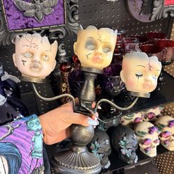 Doll candle holder
