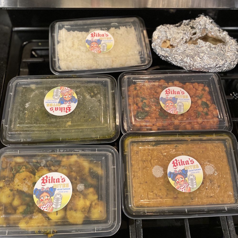 a variety of food in plastic containers a variety of food in plastic containers