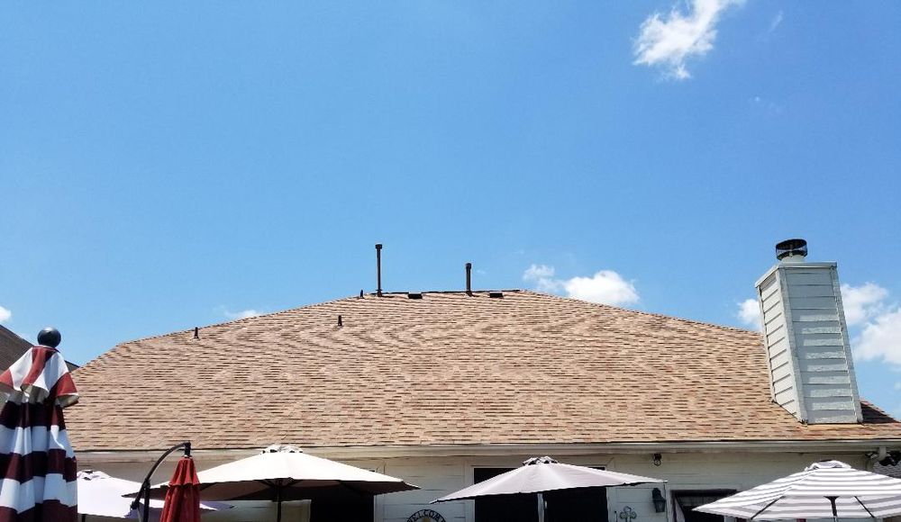 Slide of Johnny's Roofing and storm restoration