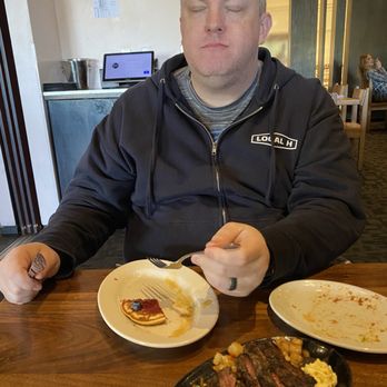 Border Grill - My husband savoring the raspberry sauce that came with the secret pancakes. - Mexican Near Me - Las Vegas, Nevada Border Grill - My husband savoring the raspberry sauce that came with the secret pancakes. - Mexican Near Me - Las Vegas, Nevada