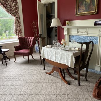 Abingdon Manor Restaurant - a dining room with red walls - Bed & Breakfast Near Me - Latta, South Carolina