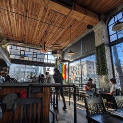 Quinn's - Rustic wood interior with huge windows.