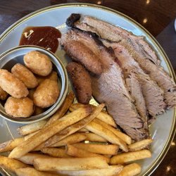 Cinder Bistro - Smoked Brisket with a side of fries and corn nuggets.