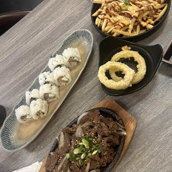 Sushi Tsunami - philly roll, bulgogi & cheese fries, onion rings, bulgogi hot plate - Sushi Bars Near Me - Pleasant Hill, California Sushi Tsunami - philly roll, bulgogi & cheese fries, onion rings, bulgogi hot plate - Sushi Bars Near Me - Pleasant Hill, California
