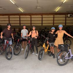 Us on the e-bikes in the rental shop.