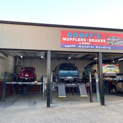 Goofy's Muffler Brakes & More - That's me on the lift at 6:15 am