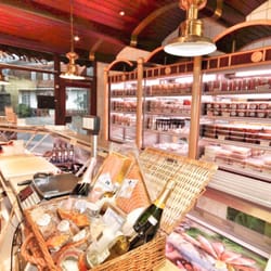 Theos Fischmarkt - THEOS Fischmarkt & Delishopper in Grömitz. Frischfisch - Räucherlachs - Räucherfisch und nordische Delikatessen aus eigener Herstellung.