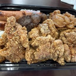 Supposedly a garlic chicken bento box. Supposedly a garlic chicken bento box.