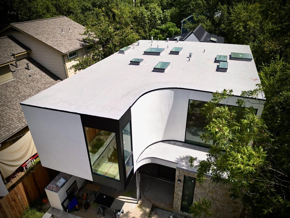 Slide of Comanche Roofing