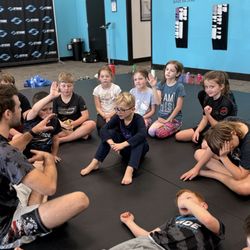 Stride Martial Arts and Fitness - Kids soaking up all the information they can before the tournament
