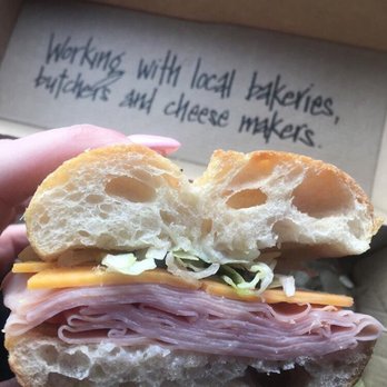 Chachi's Sandwich Bar - a person holding a sandwich - Sandwiches Near Me - Calgary, Alberta