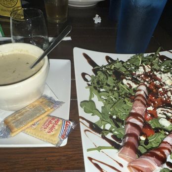 Fat Tony's Italian Pub - Clam chowder and arugula pear salad - Italian Near Me - Wilmington, North Carolina Fat Tony's Italian Pub - Clam chowder and arugula pear salad - Italian Near Me - Wilmington, North Carolina