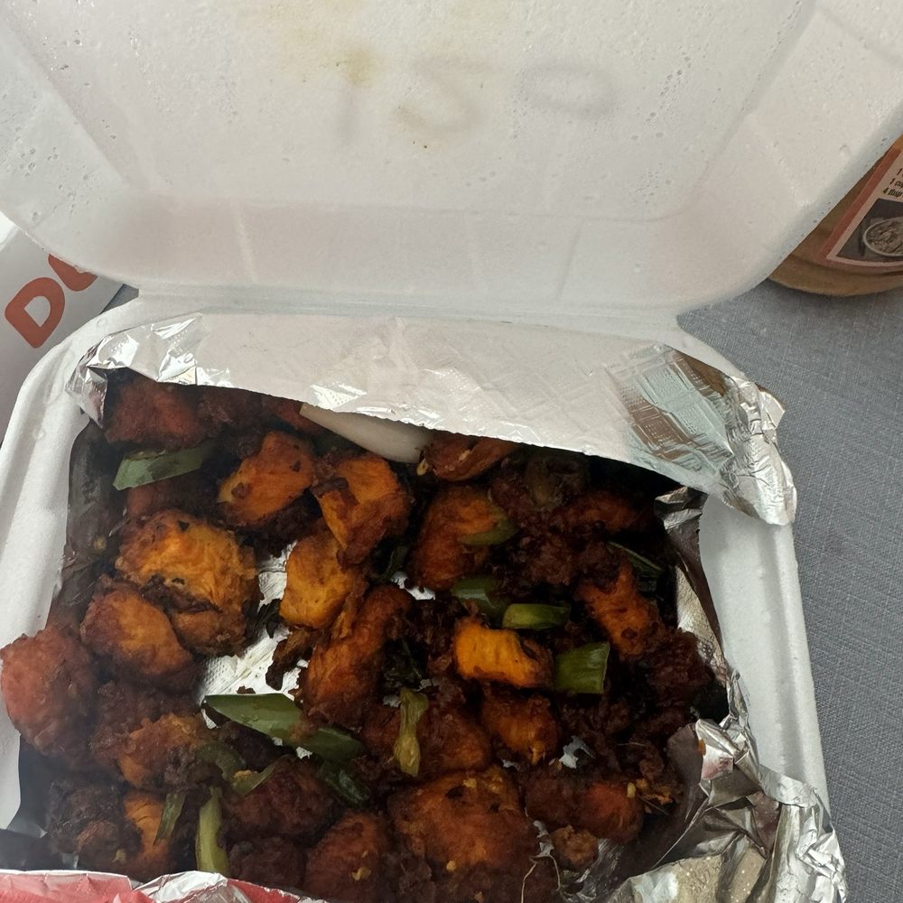 Chili Chicken served with a side of Fly