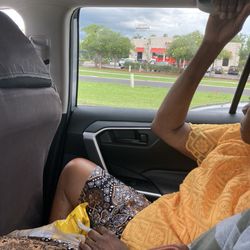 Family Dollar - Passing by Family Dollar in Uber /Lyft Share  ride ! Passenger sitting next to me has a Longvhamp purse !