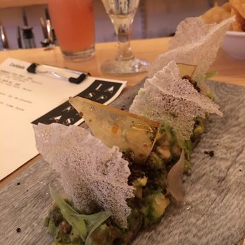Las Puertas - Guacamole with caramel pieces and crumbled crickets - Latin American Near Me - Buffalo, New York Las Puertas - Guacamole with caramel pieces and crumbled crickets - Latin American Near Me - Buffalo, New York
