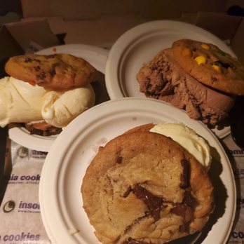 Insomnia Cookies - Chocolate chip cookie-wich with vanilla ice cream (2) and one with chocolate ice cream - Desserts Near Me - Chicago, Illinois