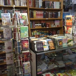 Libreria Cristiana Palabra De Dios - Spanish Bibles behind greeting cards.