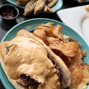 The Farmer’s Table - Brisket cheesesteak sandwich w/ house made chips - Pubs Near Me - Medina, Ohio The Farmer’s Table - Brisket cheesesteak sandwich w/ house made chips - Pubs Near Me - Medina, Ohio