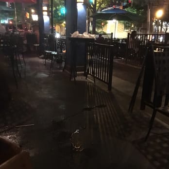 Uncle Julio's - Spilled drinks everywhere and trays full of dirty dishes that no one bothered to pick up during the entire time we were there. - Mexican Near Me - Bethesda, Maryland