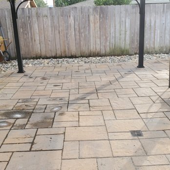 Nick's Demo & Hauling - a patio with a fire pit - Junk Removal & Hauling Near Me