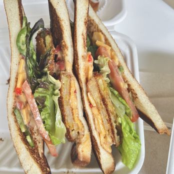 La Tour Cafe - Fried Green Tomato Sandwich - don't sleep On it! Loved it! Flavors are all there! Get it with garlic fries ! - Cafes Near Me - Honolulu, Hawaii La Tour Cafe - Fried Green Tomato Sandwich - don't sleep On it! Loved it! Flavors are all there! Get it with garlic fries ! - Cafes Near Me - Honolulu, Hawaii