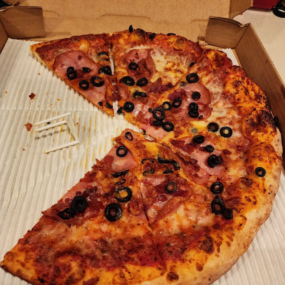 Champ Pizza - Pizza with pepperoni, ham, bacon and olives. - Pizza Near Me - Vancouver, Washington Champ Pizza - Pizza with pepperoni, ham, bacon and olives. - Pizza Near Me - Vancouver, Washington