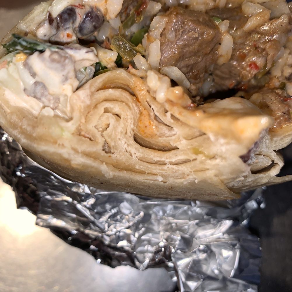 Chipotle Mexican Grill - Who wants a burrito with 6 layers of tortilla on one side? Chipotle, this is an abomination. Constant double tortilla wraps. - Fast Food Near Me - Sammamish, Washington