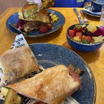 Castro’s - Front to Back: Castro Sandwich, Seasonal Fruit, French Toast Special - Latin American Near Me - Honolulu, Hawaii