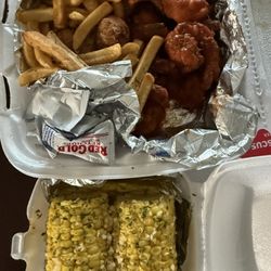 Buffalo shrimp platter and corn with hot honey butter
