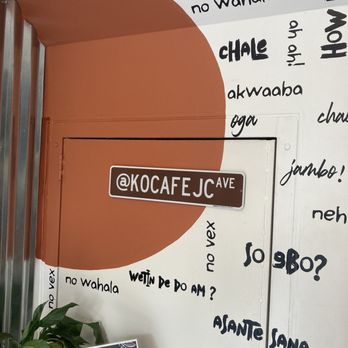 Kọ Cafe - a sign on the wall of a coffee shop - Coffee & Tea Near Me - Jersey City, New Jersey
