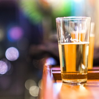 Litl Bit Bar And Grill - a glass of beer - Sports Bars Near Me - Evans, Colorado