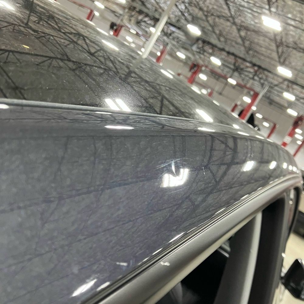Tesla - Damage to railing from tool falling on the car during dealer repair. - Car Dealers Near Me - Santa Clarita, California Tesla - Damage to railing from tool falling on the car during dealer repair. - Car Dealers Near Me - Santa Clarita, California