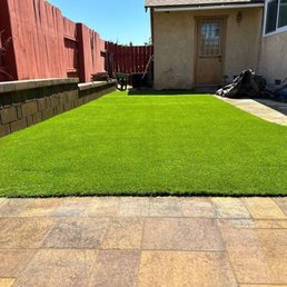 Paver patio, retaining wall planter bed & artificial turf Paver patio, retaining wall planter bed & artificial turf