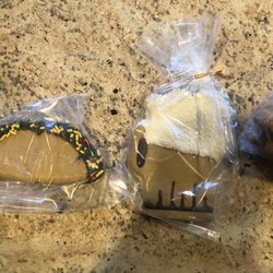 Bark & Purr - Beer and Taco cookies and a bag of assorted treats.