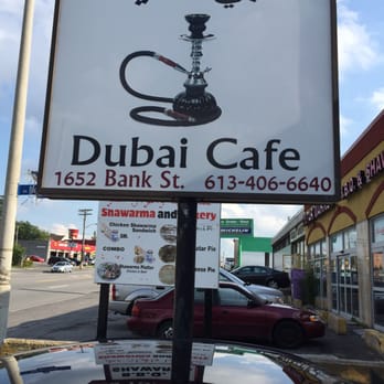 Dubai Cafe - a sign with a hook on it - Hookah Bars Near Me - Ottawa, Ontario Dubai Cafe - a sign with a hook on it - Hookah Bars Near Me - Ottawa, Ontario