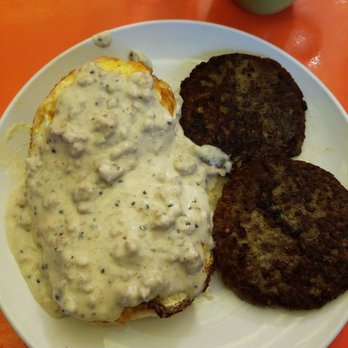 The Funky Brunch Cafe - Sausage biscuits and gravy with sausages. - Breakfast & Brunch Near Me - Savannah, Georgia The Funky Brunch Cafe - Sausage biscuits and gravy with sausages. - Breakfast & Brunch Near Me - Savannah, Georgia
