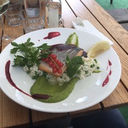 Solna 12 - Roasted salmon served with pea and fennel risotto with pea purée and raspberry sauce. Yummy!