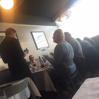 MA'S Italian Kitchen - Presumably this man was ordering something for the other man. Humans are fascinating! - Italian Near Me - Burbank, California