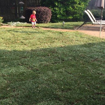 P & R Landscaping - a young boy in a backyard playing with a frisbee - Landscaping Near Me - North Richland Hills, Texas P & R Landscaping - a young boy in a backyard playing with a frisbee - Landscaping Near Me - North Richland Hills, Texas