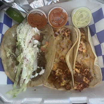 Taqueria Berenice - Breakfast tacos (egg, Mexican chorizo, potato and cheese) And a beef tongue quesadilla - Food Trucks Near Me - Manor, Texas Taqueria Berenice - Breakfast tacos (egg, Mexican chorizo, potato and cheese) And a beef tongue quesadilla - Food Trucks Near Me - Manor, Texas