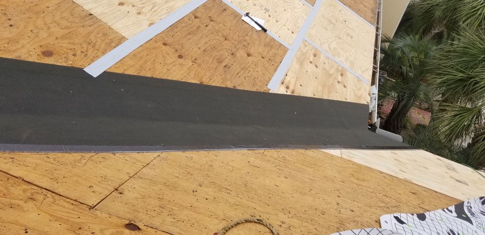 Slide of T-Roys Relief Roofing