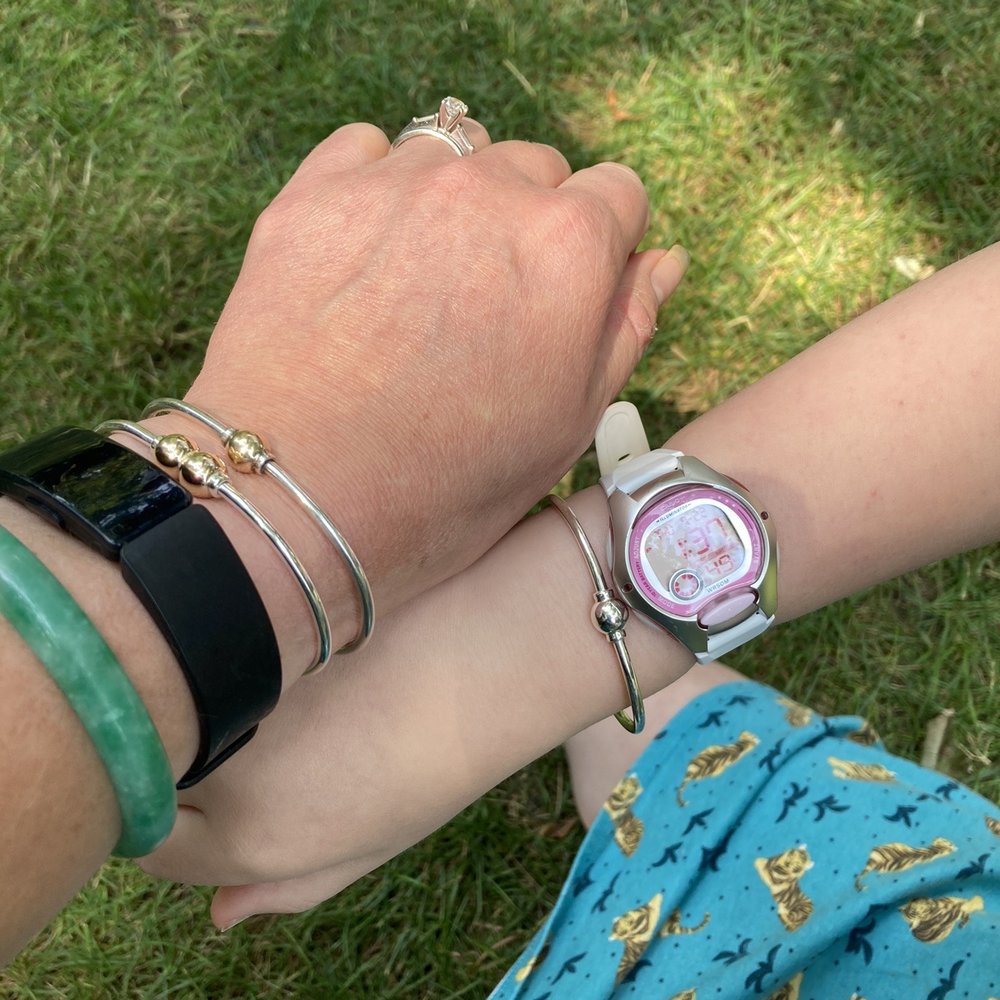 My 20 year old Single screw ball bracelet, my new double, and my stepdaughter's new all silver bracelet!  Thanks for a great experience!