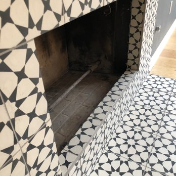 LA Custom Tile - Notice how the tile pattern flows seamlessly from the face of the fireplace to inside the fireplace. Beautiful! - General Contractors Near Me - Los Angeles, California
