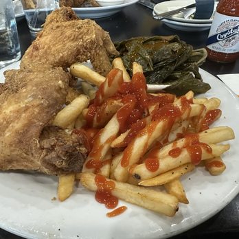 Colin's Seafood and Grill - Fried chicken wings, French fries and collard greens - Cajun/Creole Near Me - Baltimore, Maryland Colin's Seafood and Grill - Fried chicken wings, French fries and collard greens - Cajun/Creole Near Me - Baltimore, Maryland