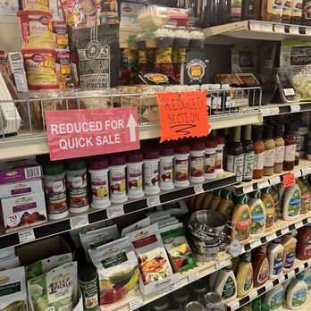 Tip N Point - a grocery store shelf with canned food - Grocery Near Me - New Lothrop, Michigan