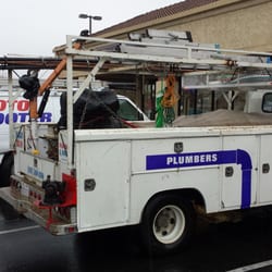 Roto Rooter Plumbers - Fixing a small leak, and cleaning a returaunt grease line